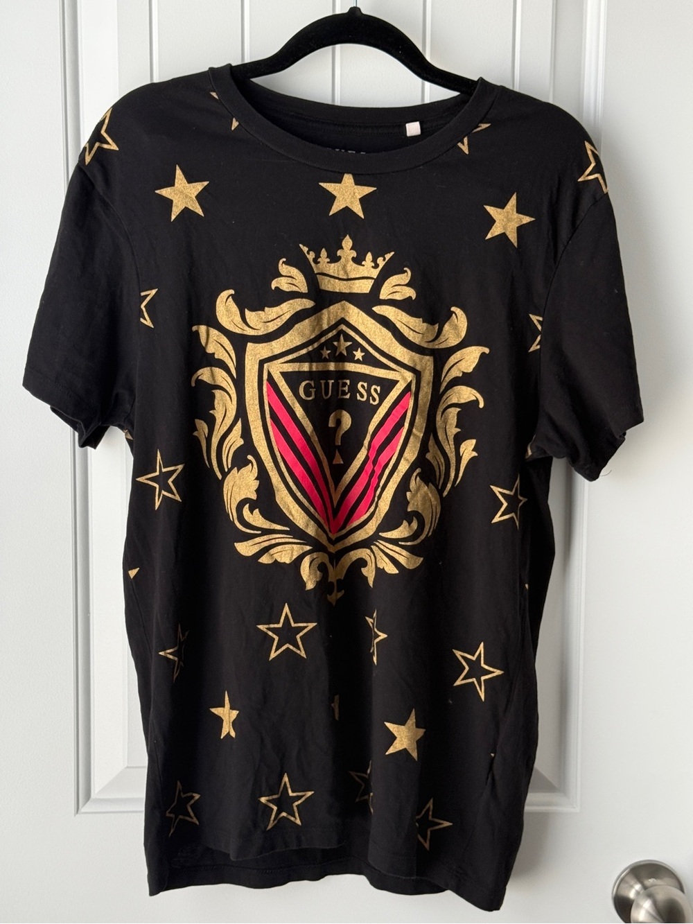 GUESS Black Tee with Gold Crest & Pink Accent